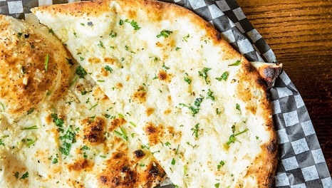 Garlic Naan freshly baked at Angeethi Flame Fine Indian Bistro Saskatoon SK